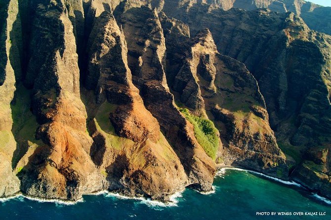 Kauai Cessna Private Air Tour - The Crater: walls on three sides and wing-tip waterfall views