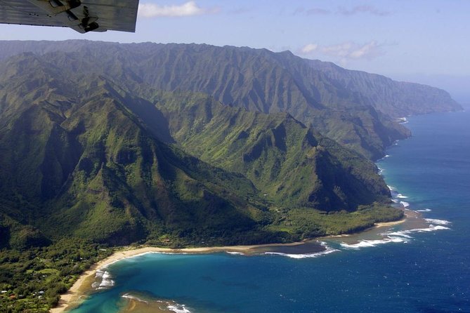 Kauai Cessna Private Air Tour - Hanalei Bay and Hanalei Valley: a waterfall ribbon show overhead