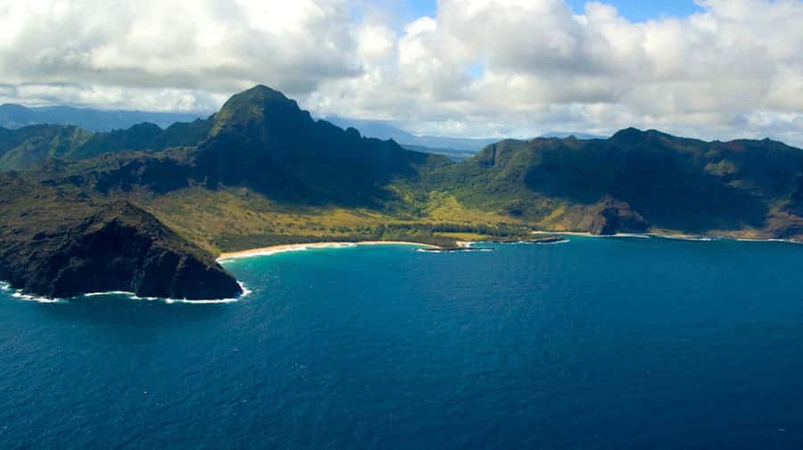 Kauai: Entire Kauai Air Tour with Window Seats - Hanalei Bay from the air: the crescent that sells the island