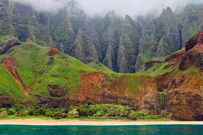 Kauai: Nā Pali Coast Zodiac Raft Expedition and Snorkeling - Stop 1: Kalalau Trail from the water (the cliffs you came for)