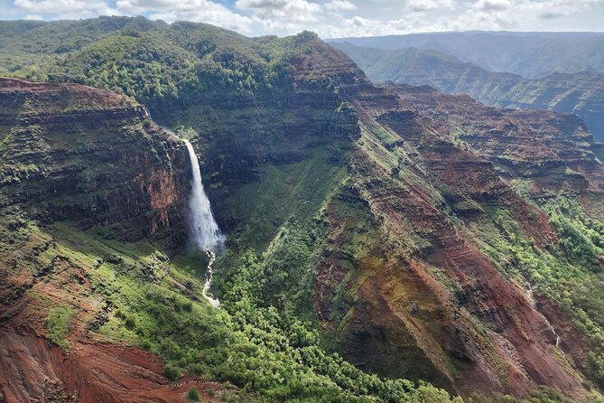 Private Kauaʻi Experience: Doors-Off ALL WINDOW SEATS - Stop 4: Kauaʻi’s wettest spot and waterfalls in the mountain walls