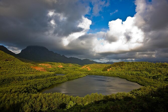 Private Kauai Eastside Waterfalls & Local Grinds - Menehune Fish Pond: legends, movie spots, and easy photos