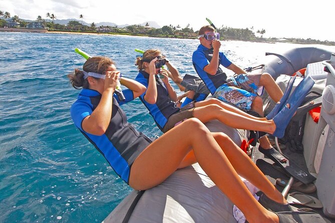 Ultimate Na Pali Coast Zodiac Boat Snorkeling and Sea Cave Tour - Na Pali Coast State Wilderness Park: caves, cliffs, and waterfall views